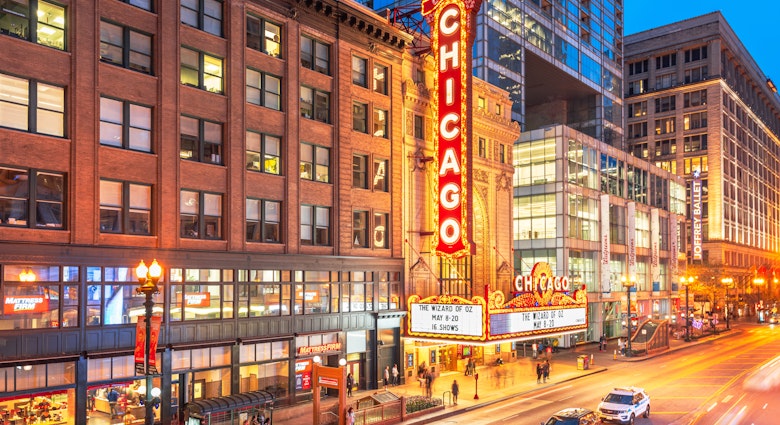 CHICAGO, ILLINOIS - MAY 10, 2018: The landmark Chicago Theatre on State Street at twilight. The historic theater dates from 1921. ; Shutterstock ID 2136945747; purchase_order:65050; job:65050; client:Hottest tickets in Chicago; other:Gemma Graham
2136945747